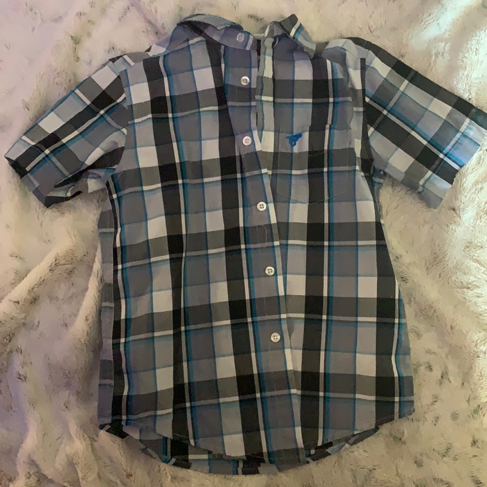 Kids button up dress shirt. No stains, no holes.